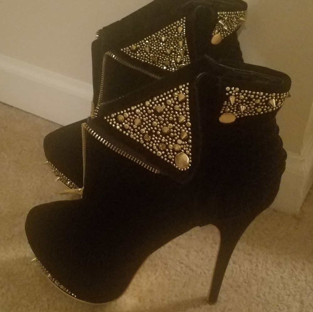 Black and gold heels with spikes